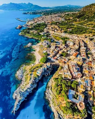 an aerial view of a town next to the ocean at Casa di Leda 1 in Santa Flavia