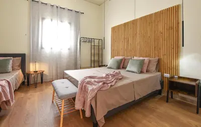 a bedroom with two beds and a window at Beautiful Apartment In Trappeto in Trappeto