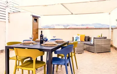 a dining room with a table and chairs at Lovely Apartment In Trappeto With Wifi in Trappeto