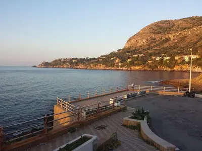 a view of a body of water with a hill at Bed And Breakfast Marina d'Aspra in Bagheria