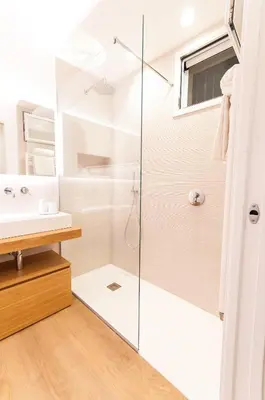 a bathroom with a shower and a sink at White Home in Castellammare del Golfo