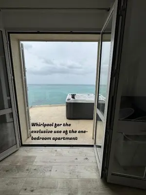 a glass door with a sign that reads withdrawal for the exclusive use of the one at La Villa di Nonna Pina in Balestrate