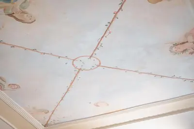 a ceiling with a chandelier in a room at Four Luxury Art in Palermo