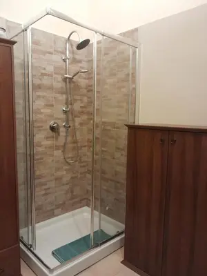 a shower with a glass enclosure in a bathroom at Casa Castelli Appartamento vacanza in Bagheria