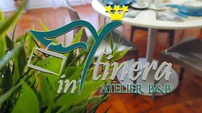 a sign for a restaurant with a table at In Itinera in Palermo