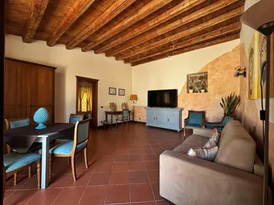 a living room with a couch and a table at Villa Lampedusa in Palermo