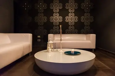 a living room with a coffee table and a couch at Villa Salvo in Balestrate
