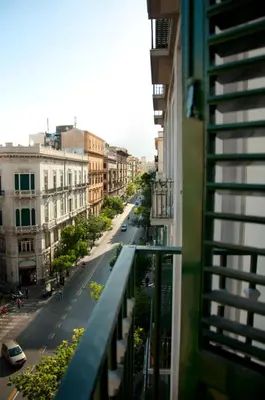 a view of a street from a balcony of a building at *1*7*4* Via Roma in Palermo