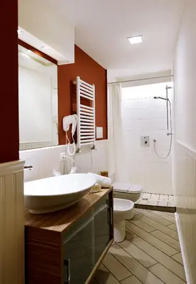 a bathroom with a sink and a toilet at *1*7*4* Via Roma in Palermo