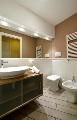 a bathroom with a sink and a toilet at *1*7*4* Via Roma in Palermo