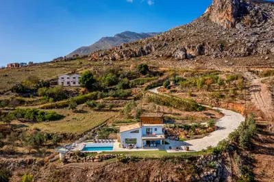 an aerial view of a house on a hill at Villa Pharus Scopello in Scopello