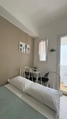 a bathroom with a sink and a mirror at Notarbartolo Room#200 in Palermo