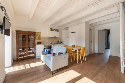 a living room with a couch and a table at Casa Valverde in Centro Storico by Wonderful Italy in Palermo