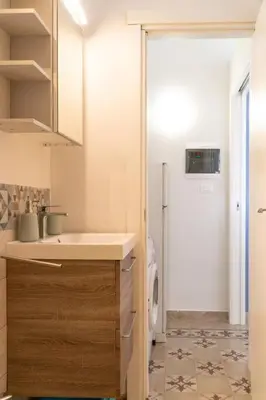 a bathroom with a sink and a toilet at B&B da Nonna Cicci APT vicino al Teatro Massimo in Palermo