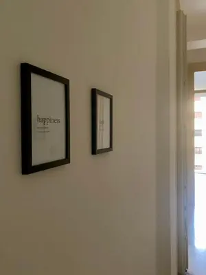 two framed pictures on a wall in a room at Urban poet retreat - casa di vincenzo e andrea 2 in Palermo