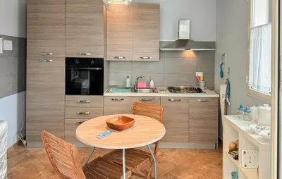 a kitchen with a table with a bowl on it at Beautiful Home In Altavilla Milicia in Altavilla Milicia