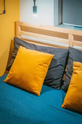 a living room with a staircase and a couch at LEGO36 Apartment in Palermo