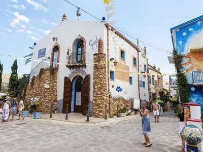 a man standing in a street in front of a building at Holiday Home Perla by Interhome in Partinico