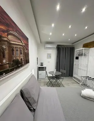 a living room with a couch and a table at Ó sole mio in Palermo