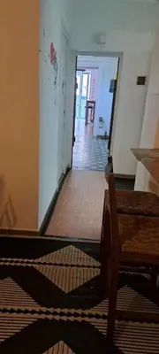 a room with a hallway with a door and a stair way at Ostello Exclusive Dependance in Palermo
