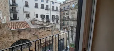 a view of a building from a window at Ostello Exclusive Dependance in Palermo