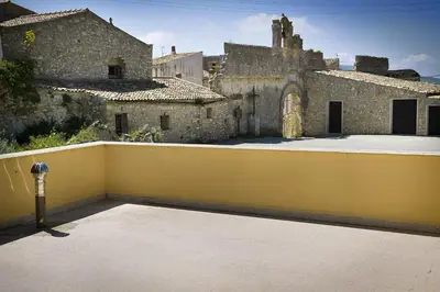 a view from the balcony of an old building at Casa Vacanza Saraceno in Castellammare del Golfo