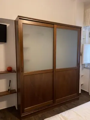 a sliding glass door in a room at Marina Mondello House comfort in Mondello