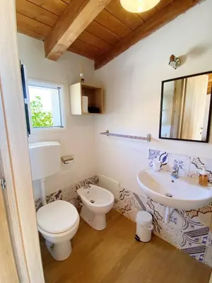 a bathroom with a toilet and a sink at B&B Pelagos in Castellammare del Golfo