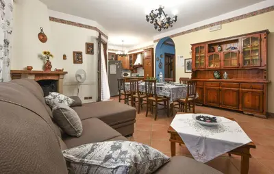 a living room with a couch and a table at 4 Bedroom Stunning Home In Trappeto in Trappeto