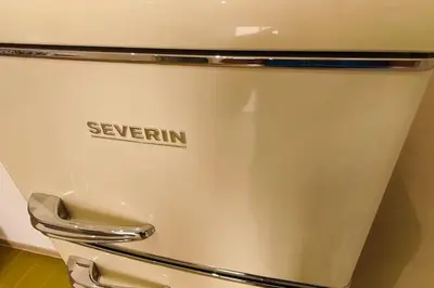 a silver refrigerator with the word severin on it at N'Amùri Casa Vacanze in pieno centro storico in Bagheria
