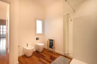 a bathroom with a toilet and a sink at Casa Madà vicino al Politeama by Wonderful Italy in Palermo
