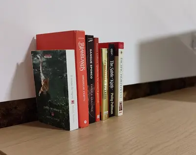 a row of books sitting on a shelf at MaMa7 in Palermo