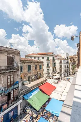 an overhead view of a city market with tents at Casa Brunaccini con Terrazza by Wonderful Italy in Palermo
