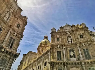 an old building with a dome on top of it at Shell Maqueda in Palermo
