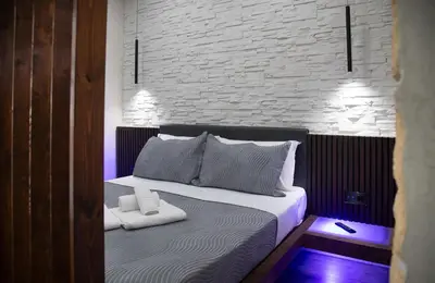 a bedroom with a bed with two towels on it at Residence Villa Rosa dei Venti in Cinisi
