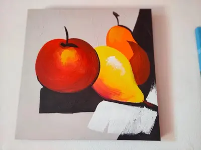 a painting of apples and oranges on a table at Casetta verde 1 Climatizzata in Castellammare del Golfo