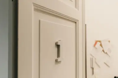 a white door with a number one on it at Sofia's Central Apartment Palermo in Palermo