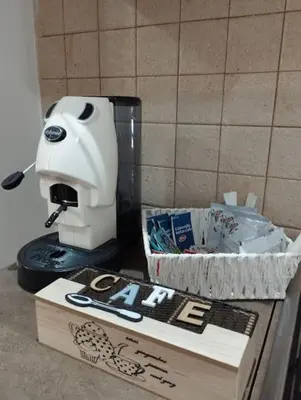 a white mixer sitting on top of a box at Appartamento centro storico.(Nina's house Venezia) in Palermo