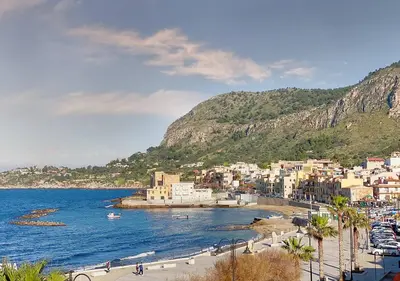 a view of a beach with buildings and the ocean at Solemar Sicilia - Casa Tosca in Ficarazzi