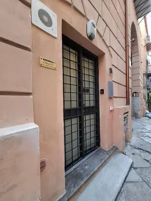 an entrance to a building with a gate at Holiday Home Celsus 84 in Palermo