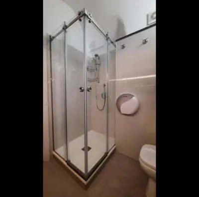 a glass shower in a bathroom with a toilet at Holiday Home Celsus 84 in Palermo