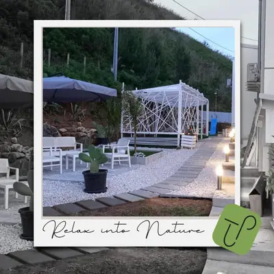a picture of a garden with a tent and chairs at Tacco e Punta bed&breakfast in Grisi