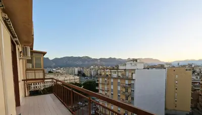 a balcony with a view of a city at Kalos in Palermo