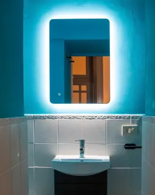 a bathroom with a sink and a mirror at VICTORIO APARTMENT in Palermo