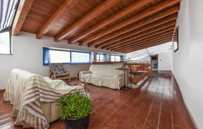a living room with two couches and a table at Amazing Home In Trappeto With Wifi in Trappeto