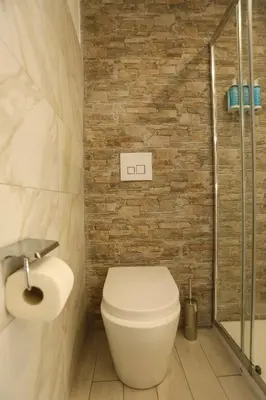 a bathroom with a sink and a shower at Gioiamia Luxury Apartment in Palermo