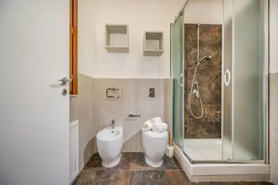 a bathroom with a shower and a toilet at Casa del Golfo Cascio in Castellammare del Golfo