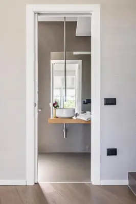 a bathroom with a sink and a mirror at Luxury villa Taravilla with pool in Altavilla Milicia