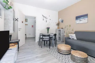 a living room with a couch and a table at GuestHost - Palermo Charming Flat with Terraces x6 in Palermo