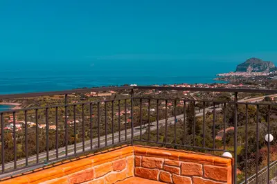 a view of the ocean from the top of a hill at Villa Le Terrazze in Cefalù